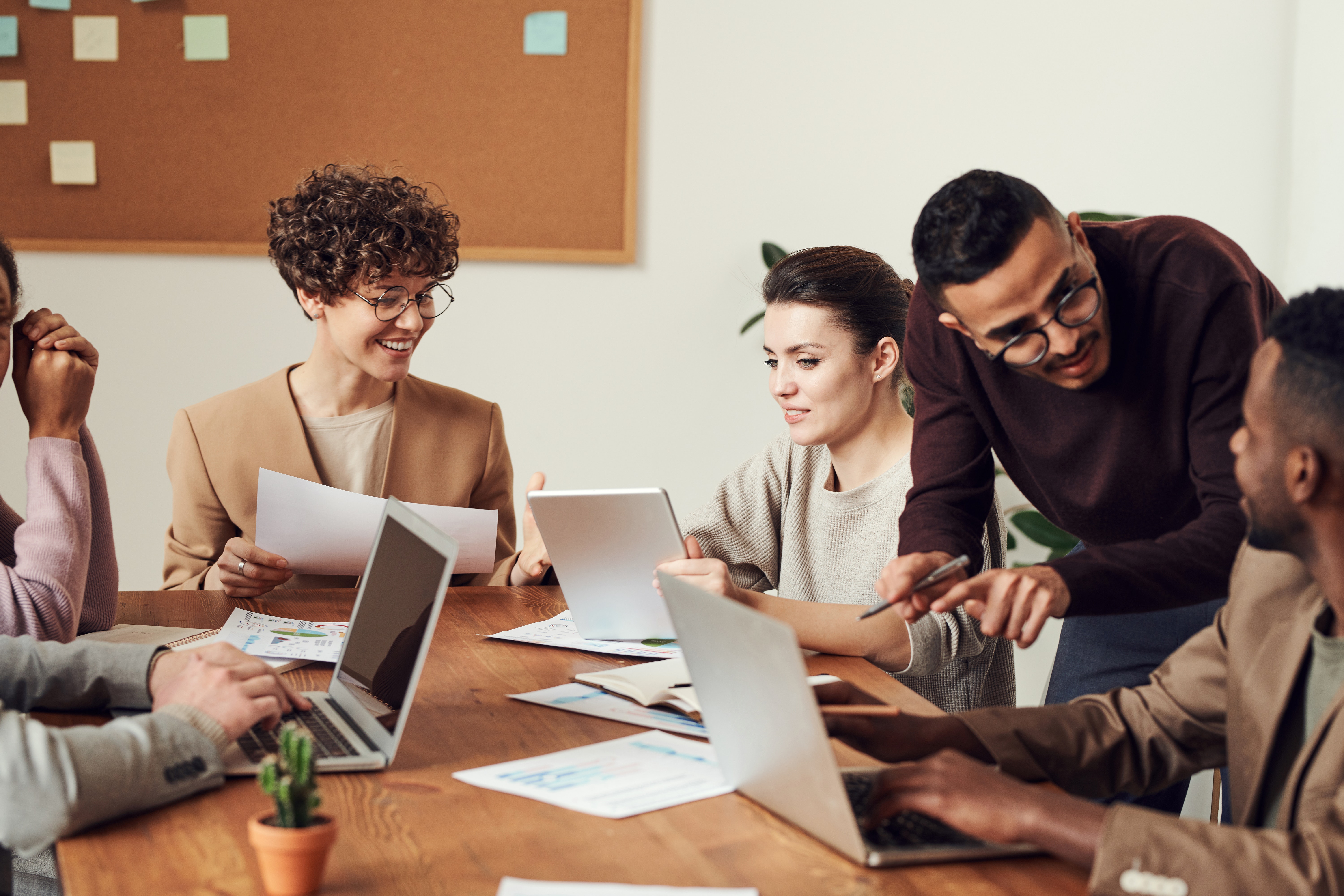 A diverse group of people working together 